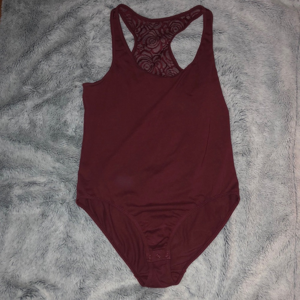 Burgundy body suit with lace.
